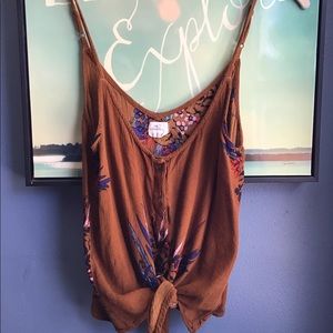 O’Neil crop top with floral pattern.